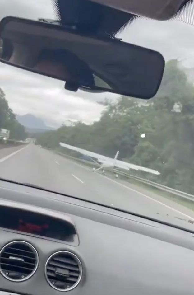 Plane making an emergency landing on a motorway.