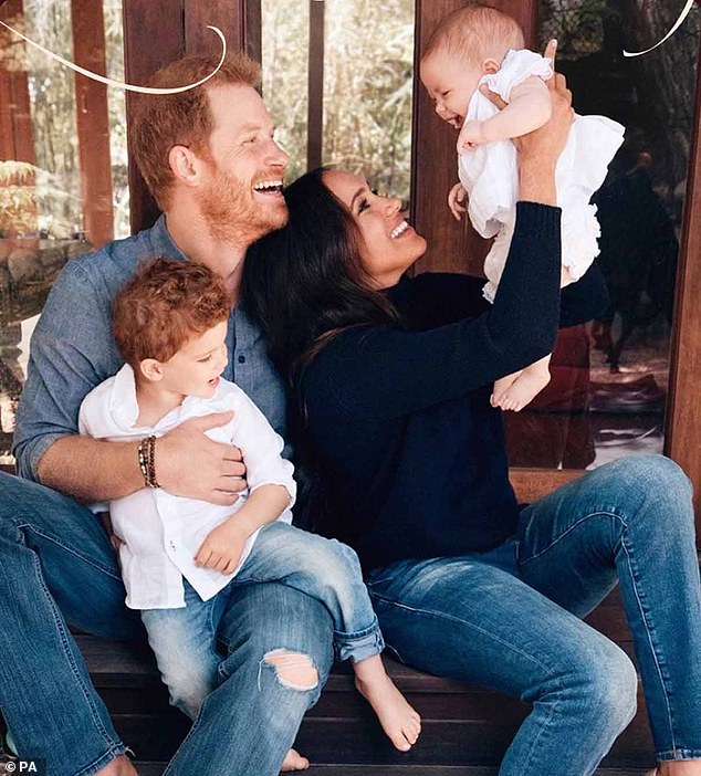 The Duke and Duchess of Sussex are pictured with Princess Lilibet and Prince Archie in 2021