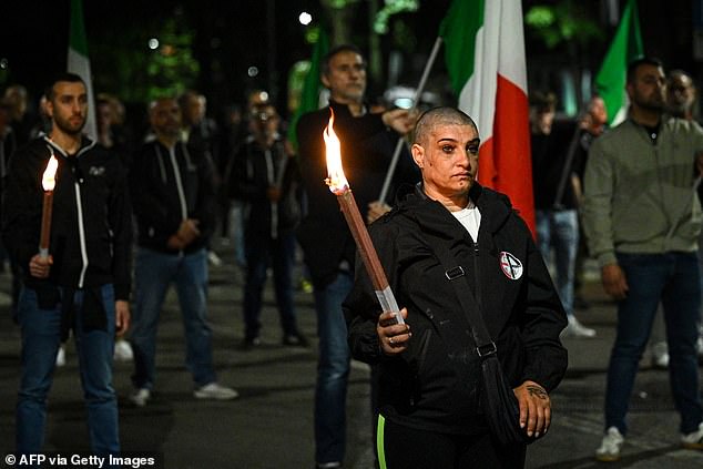 Echoes of Bella Ciao could be heard through the procession in via Paladini as anti-fascists sang the resistance song from apartment windows
