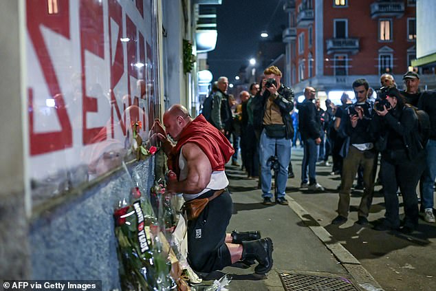 A neo-fascist is seen kneeling at the mural dedicated to Ramelli