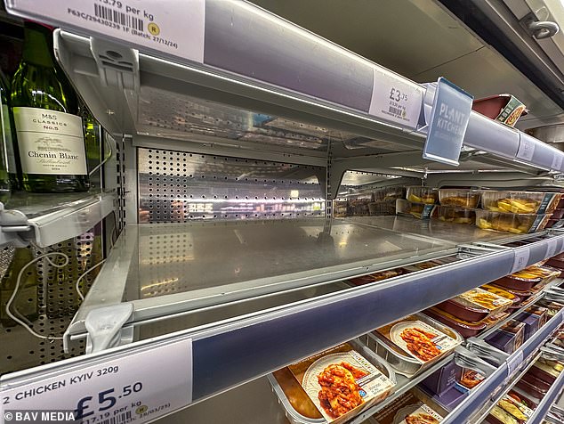 Empty food shelves at Marks and Spencer in Cambridge as the retailer struggles to manage the fallout from the cyber attack