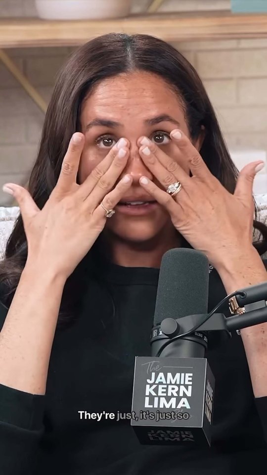 Meghan Markle crying during a podcast interview.