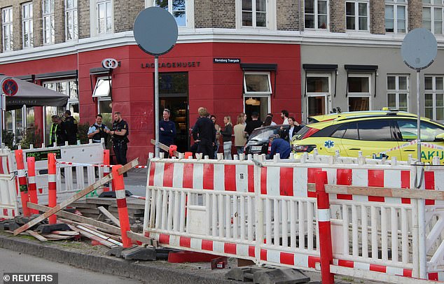 Police and rescue workers operate at Sortedam Dossering, where a car drove into a crowd