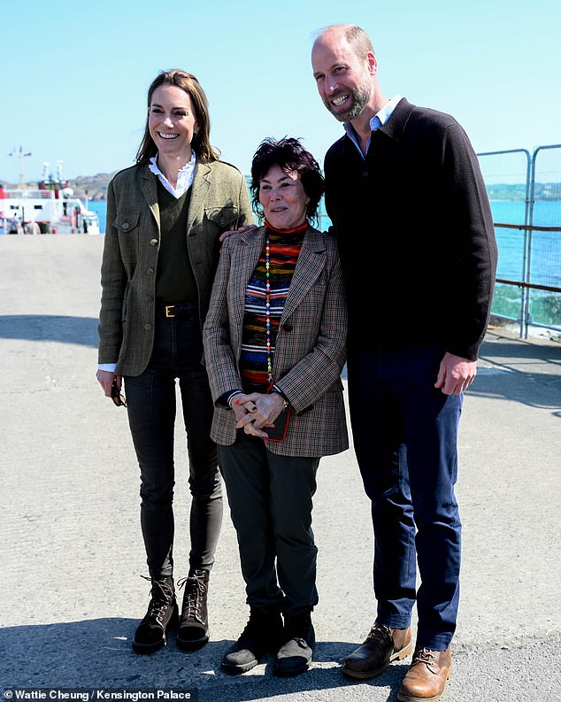 The Prince and Princess of Wale s had a surprise encounter with a comedy legend on their wedding anniversary trip. Ruby Wax , 72, spotted the royals on the Isle of Iona, in Scotland, after they had travelled there to meet the local community and learn about their way of life. Pictured: The Duke and Duchess of Rothesay pose for a picture with Ruby Wax