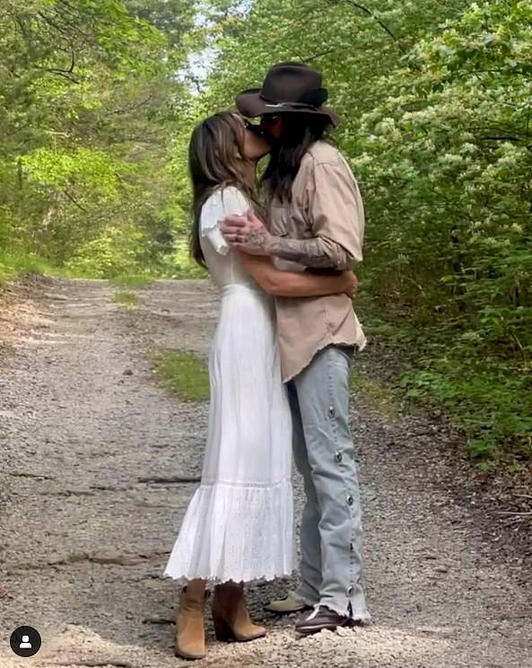 Billy Ray Cyrus and Elizabeth Hurley were seen in a fresh photo on Wednesday. The two were locked in a passionate kiss in a snapshot posted to Instagram