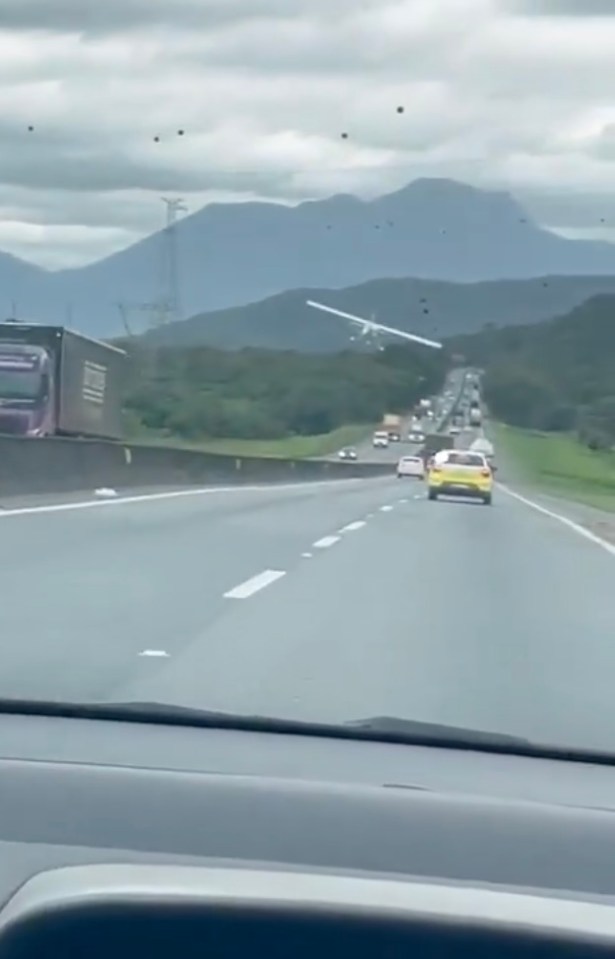 Plane making emergency landing on highway.