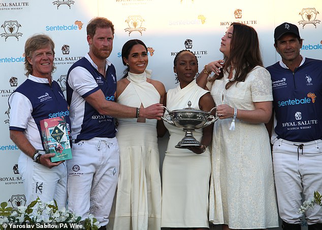 Dr Chandauka is pictured with the Sussexes at the Royal Salute Polo Challenge held in Florida in April last year to raise funds for Sentebale