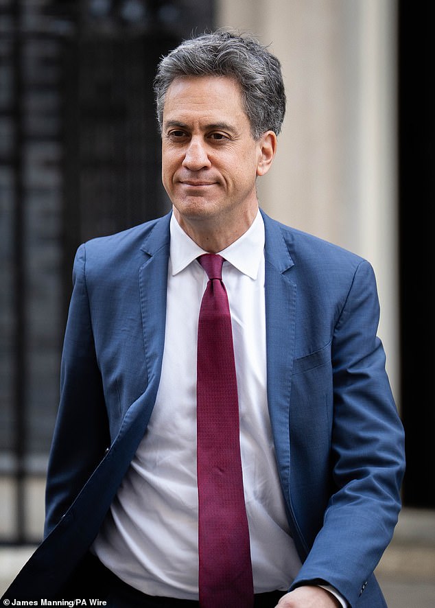 Energy Secretary Ed Milliband leaves Downing Street, London, after a Cabinet meetin
