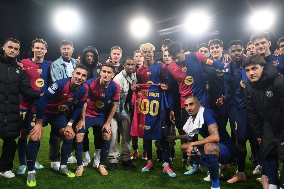 Lamine Yamal of FC Barcelona with teammates celebrating his 100th appearance.