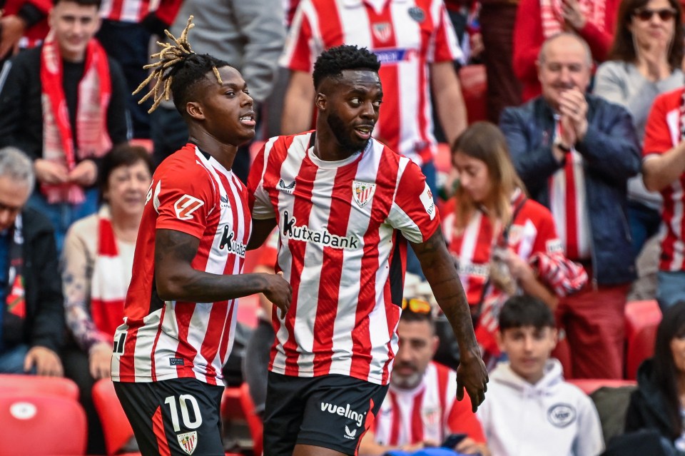 Athletic Bilbao forwards Nico Williams and Inaki Williams celebrating a goal.