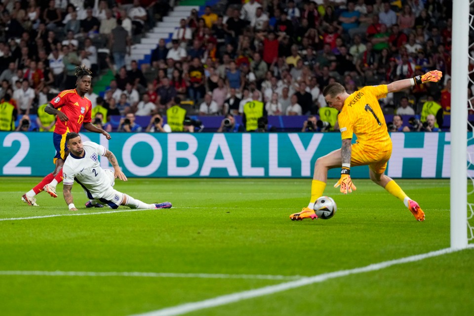 Spain's Nico Williams scoring a goal during a soccer match.