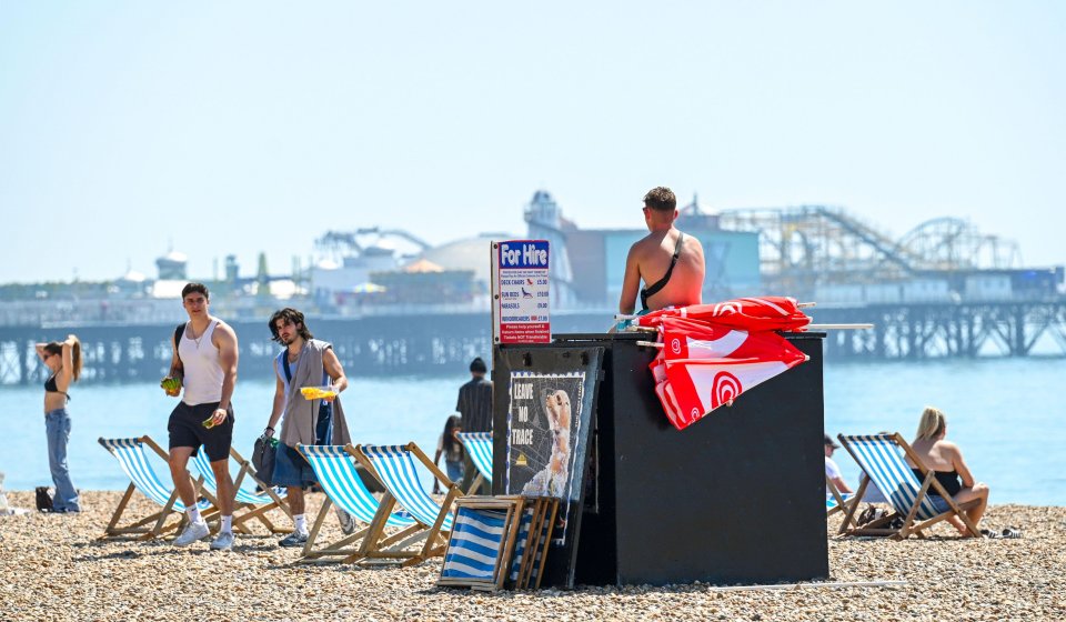 Crowds enjoying a hot day at the beach.