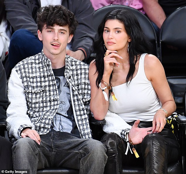 Along with packing on the PDA with her A-list boyfriend, Jenner also showed love to the Lakers during the game