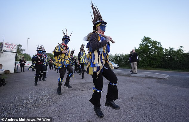 Hook Eagle Morris dancers in Hook, Hampshire, this morning as they see in the May Day dawn