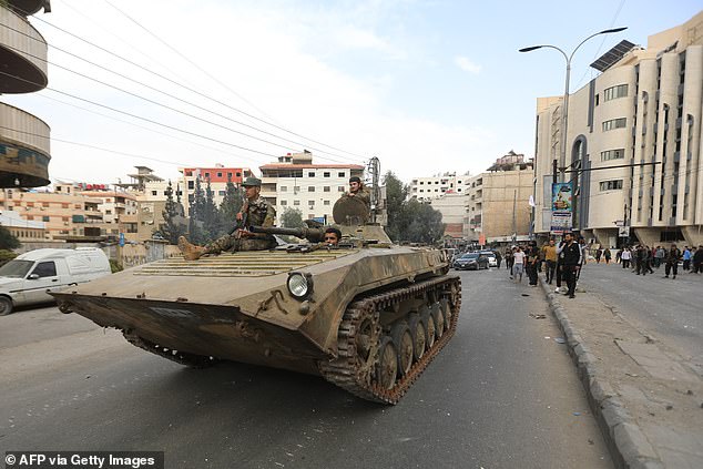 Members of Syria's security forces deploy in an area near the Syrian capital Damascus on April 30, 2025