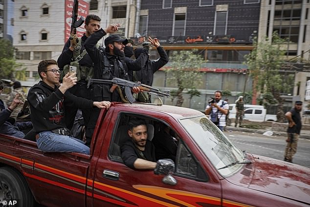 Members of Syria's security forces deploy in the town of Sahnaya, south of Damascus, on Wednesday, April 30, 2025
