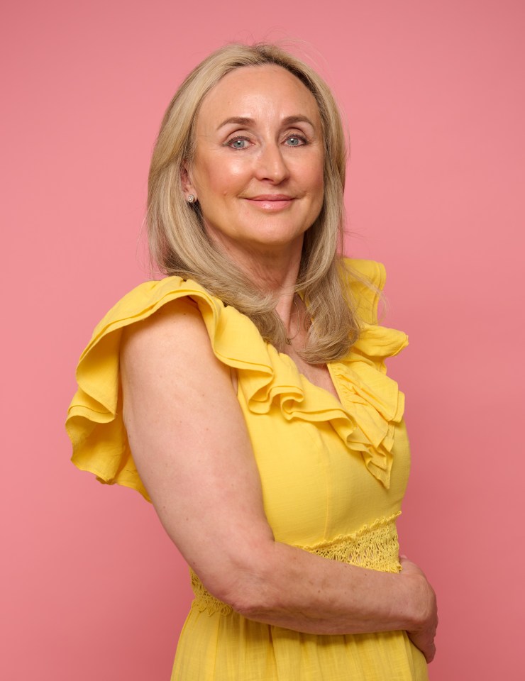 Woman in yellow dress against pink background.