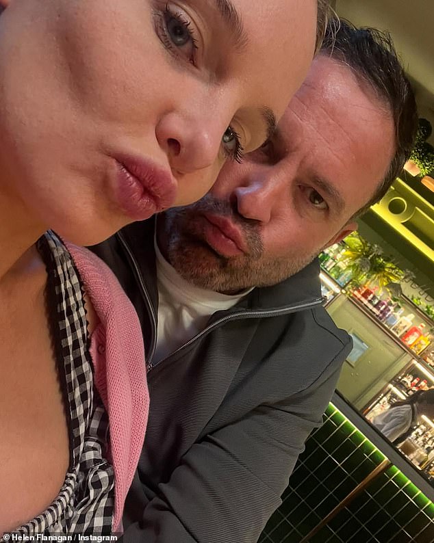 In another snap from the update, Helen and boyfriend Robbie Talbot, 45, put on their best pouts while in a pub, as she wore a pink cardigan over a black-and-white checked blouse