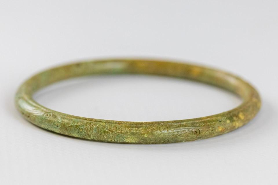 Ornate bronze bracelet from burial 791.