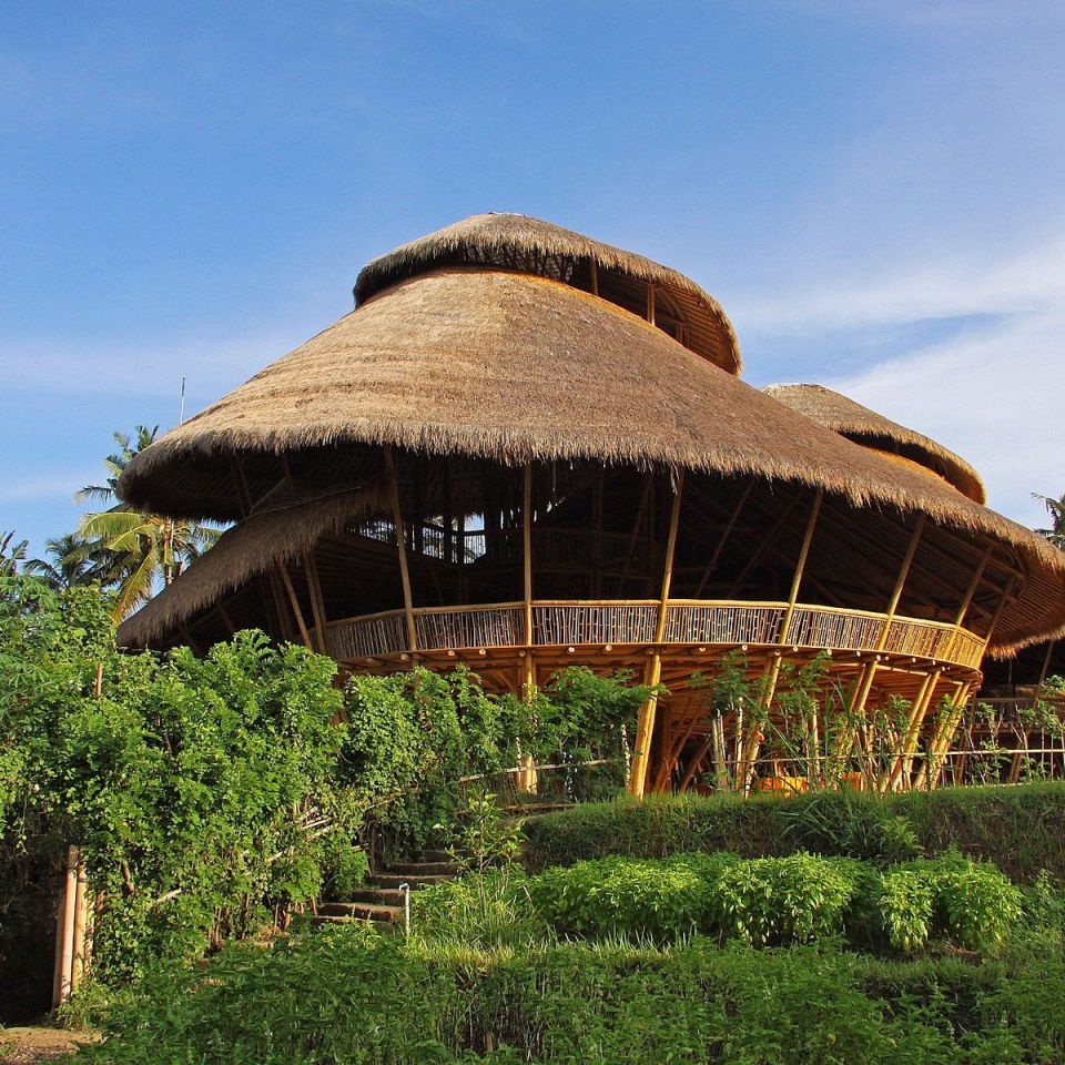 Bamboo structure with thatched roof.