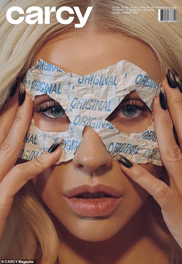 One image which saw Christina hold a mask to her face - printed with the word original - gave fans a major ironic hint that she has a whole new visage