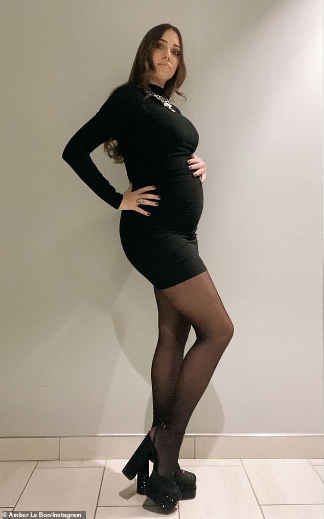 Amber spent 40 hours in labour with Sasha - who weighed 7lbs 6oz - and had both Ben and her mother by her side at London's Chelsea and Westminster Hospital