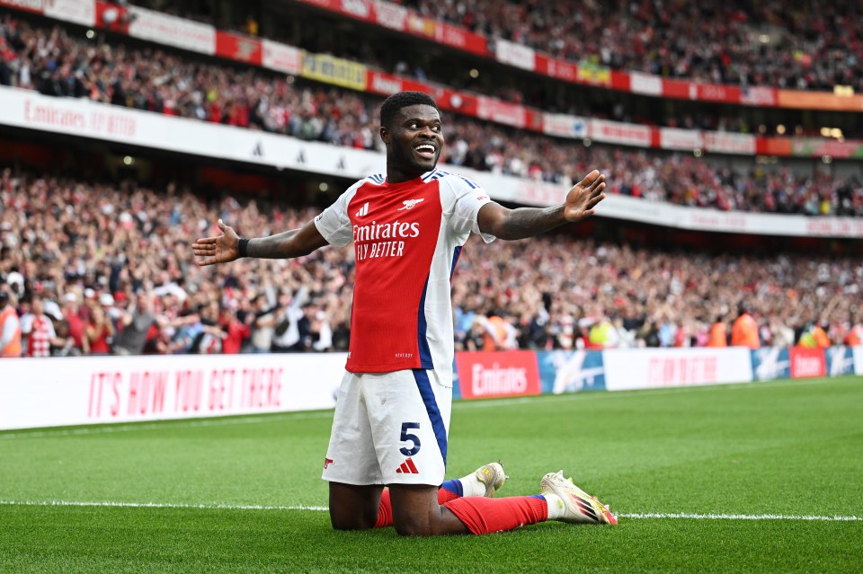 Thomas Partey of Arsenal celebrating a goal.