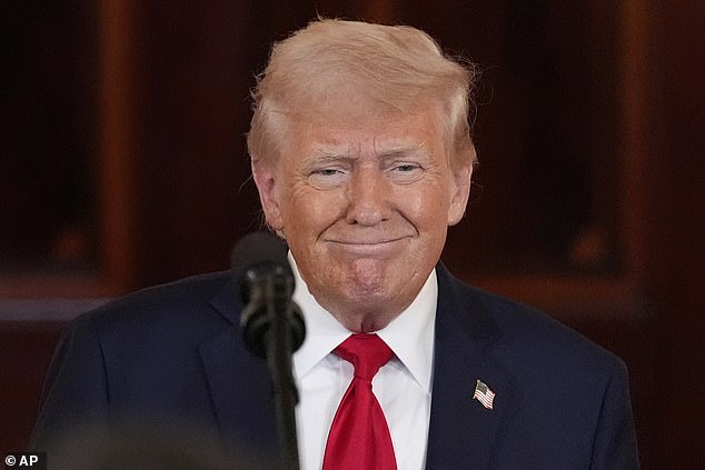 She singled out President Trump, seen here on Wednesday, and accused him of 'the biggest manmade economic crisis in modern presidential history.'