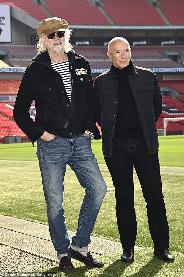 Almost forty years after 72,000 fans converged for an epic string of performances from some of the biggest stars of the 1980s, the pair posed for photos on Wembley's hallowed turf