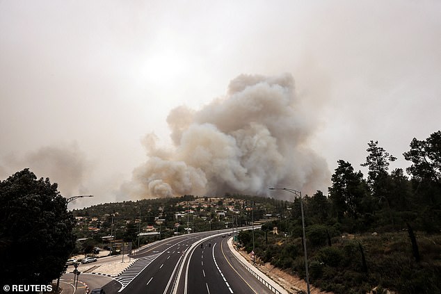 Footage shows thick smoke billowing above highways as motorists abandoned their vehicles