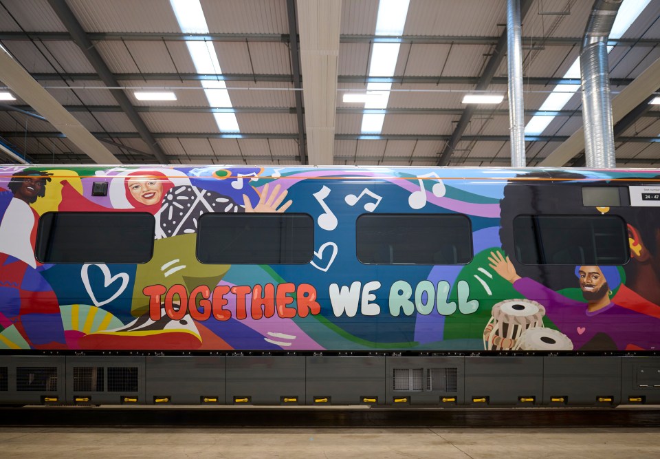 Train wrapped in artwork celebrating employees and communities.