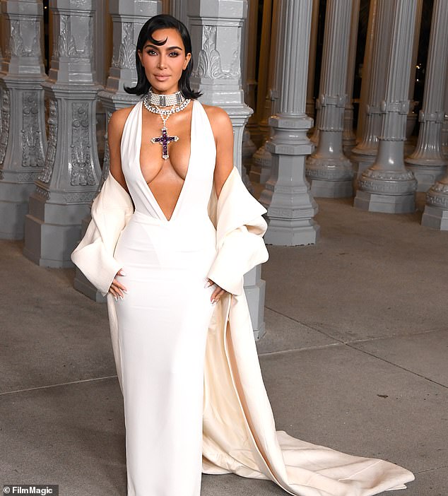 A terrified Kim Kardashian is beefing up her already robust security team after her ex-husband Kanye West 's unhinged outbursts sparked fears for her safety, the Daily Mail has learned