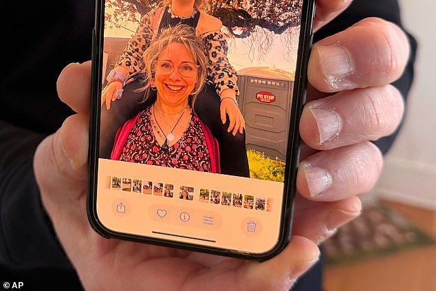 Among those who died was Noel's 50-year-old painter wife Jen as he share a snap of her with Associated Press