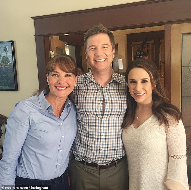 Noel is best known for his work on several Hallmark Channel shows and films including: Garage Sale Mystery: All That Glitters, When Calls the Heart, Chesapeake Shores, Harvest Love, Reunited at Christmas and Roux the Day: A Gourmet Detective Mystery; he is seen with Kirsten Robek (left) and Lacey Chabert on set of 2017's All Of My Heart: The Wedding
