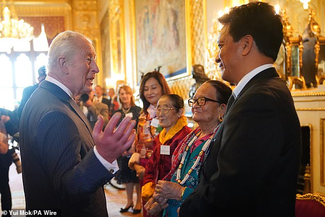 The King is patron of the association, following in the footsteps of his late mother and grandmother. He is seen here greeting attendees