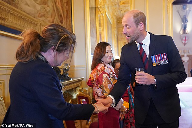 Prince William (right) joined his father, King Charles, and step-mother, Queen Camilla, (both not pictured) for the reception that marked a rare joint engagement