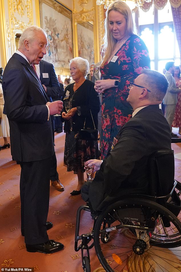 The King and his son both spoke to Major Peter Norton GC, a triple amputee.