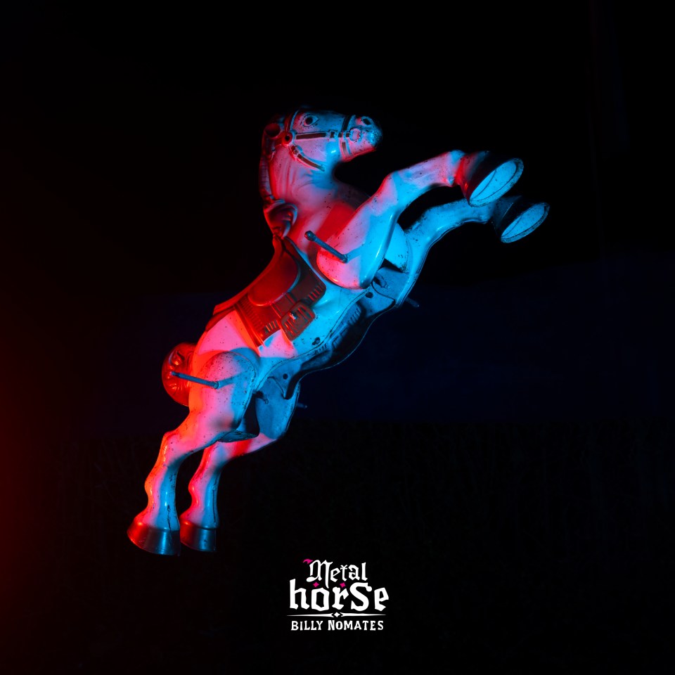 Metal Horse by Billy Nomates album art: a carousel horse in red and blue light.
