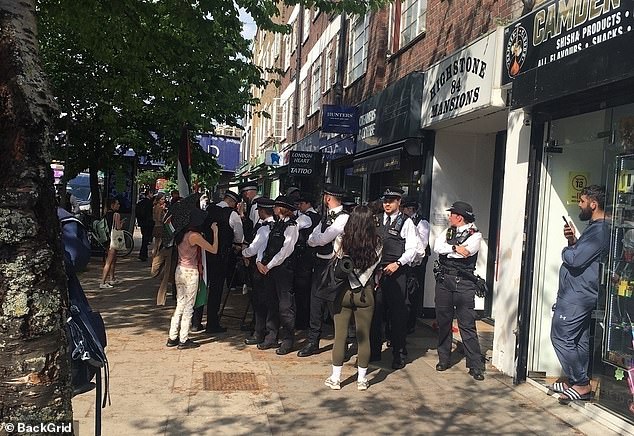 Pictures show around a dozen police officers engaging with protesters on Camden Road. It is unclear if any arrests were made