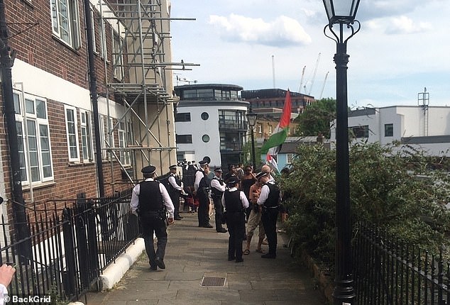 Pictures show around a dozen police officers engaging with protesters on Camden Road. It is unclear if any arrests were made