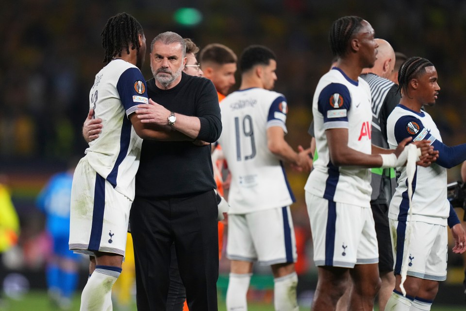 Ange Postecoglou, Tottenham's head coach, celebrates with players.