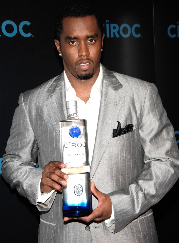 Sean "Diddy" Combs holding a bottle of Ciroc Vodka.