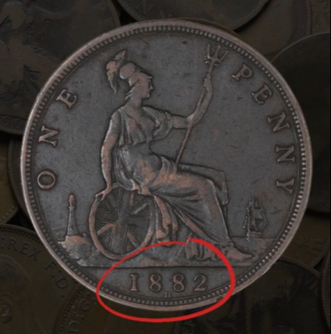 Close-up of an 1882 British one penny coin.