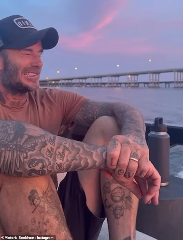 David showed off his tattoos in a snap of the former Real Madrid star taken next to a sunset, as he wore a brown t-shirt and black baseball cap