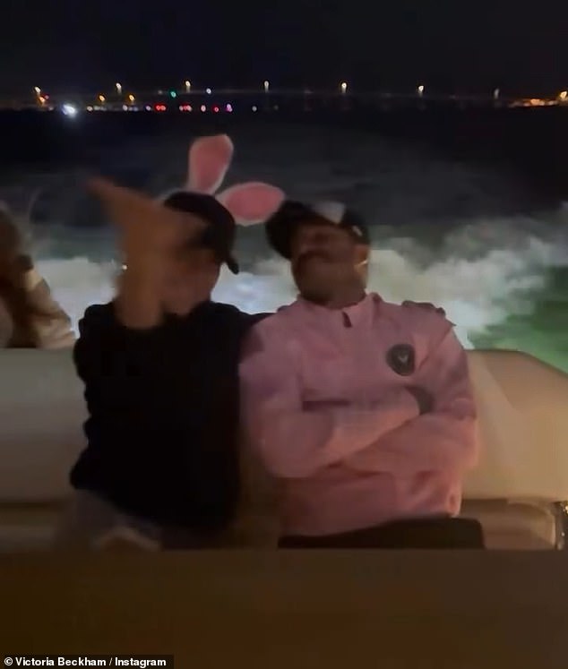 More cute family videos included one of the clan taking a boat ride at night as David donned a white tracksuit top