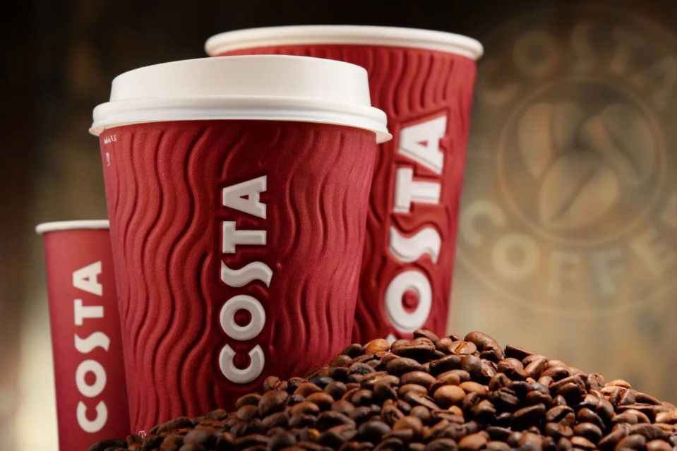 Costa Coffee cups and coffee beans.