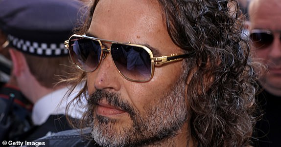 LONDON, ENGLAND - MAY 02: Russell Brand arrives at Westminster Magistrates' Court on May 02, 2025 in London, England. The charges relate to accusations of rape, indecent assault and sexual assault between 1999 and 2005. (Photo by Neil Mockford/Getty Images)