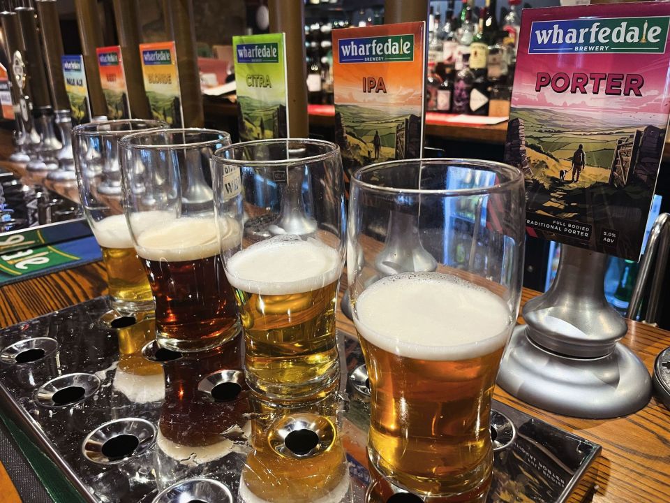 Pints of Wharfedale Brewery beer at a pub.