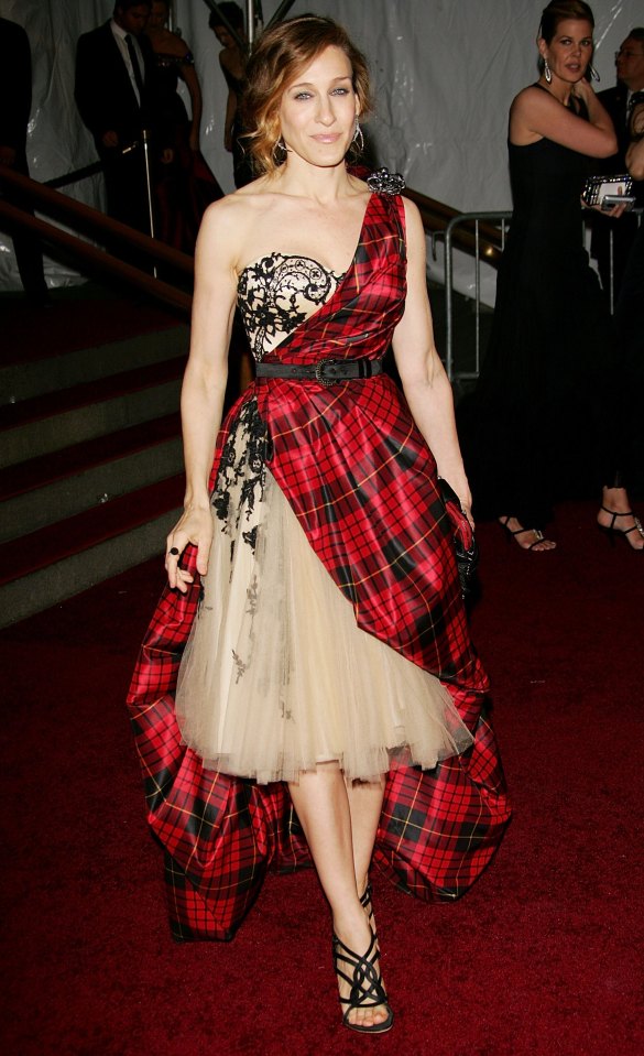 Sarah Jessica Parker in a red plaid dress at a gala.