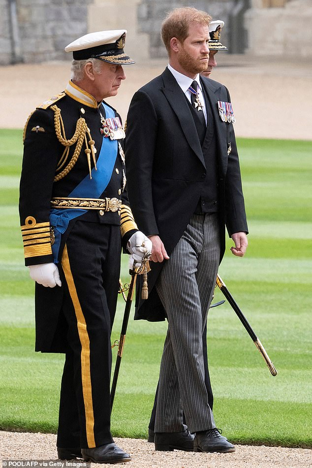Charles with Harry at St George's Chapel in 2022. Short of Charles making a private trip to the US, the King may never see his two youngest grandchildren Archie and Lilibet again